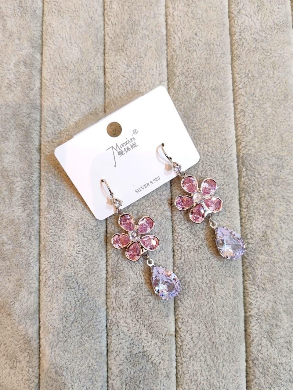 Petal soft pink crystals. Ice clear zircon teardrops.