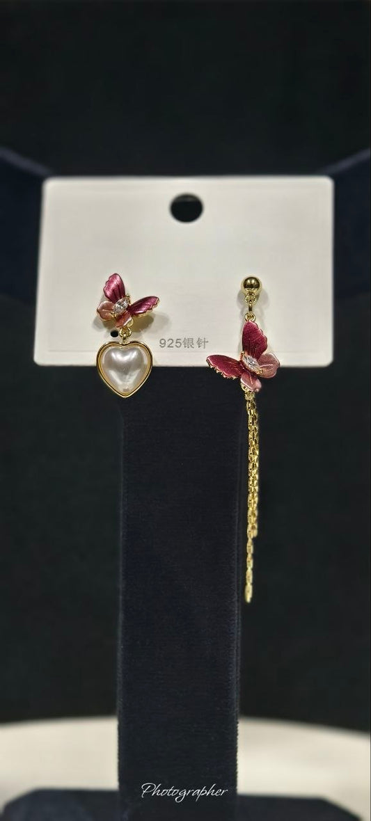 Red Butterfly charm with a dreamy pearl heart